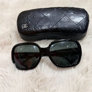 CHANEL Elegant Black Sunglasses with Quilted Case